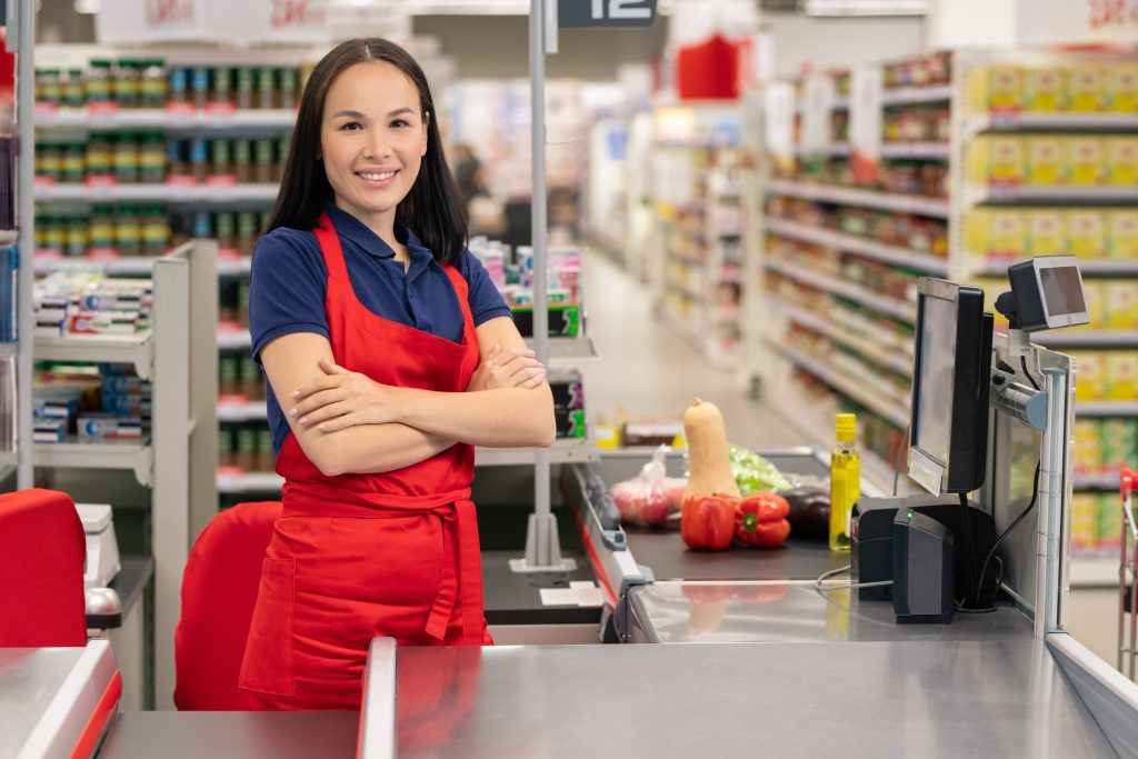 Asian Woman Working In Hypermarket