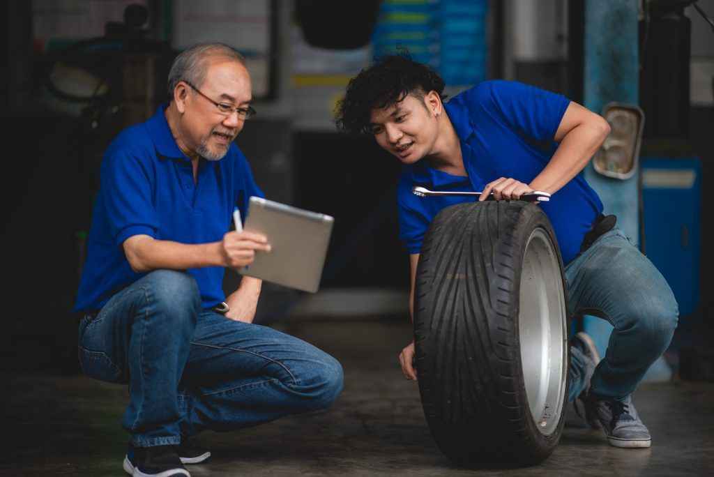 mechanic car service garage center, repairman worker person working for maintenance auto repair the car in vehicle workshop station, automobile transportation service work concept